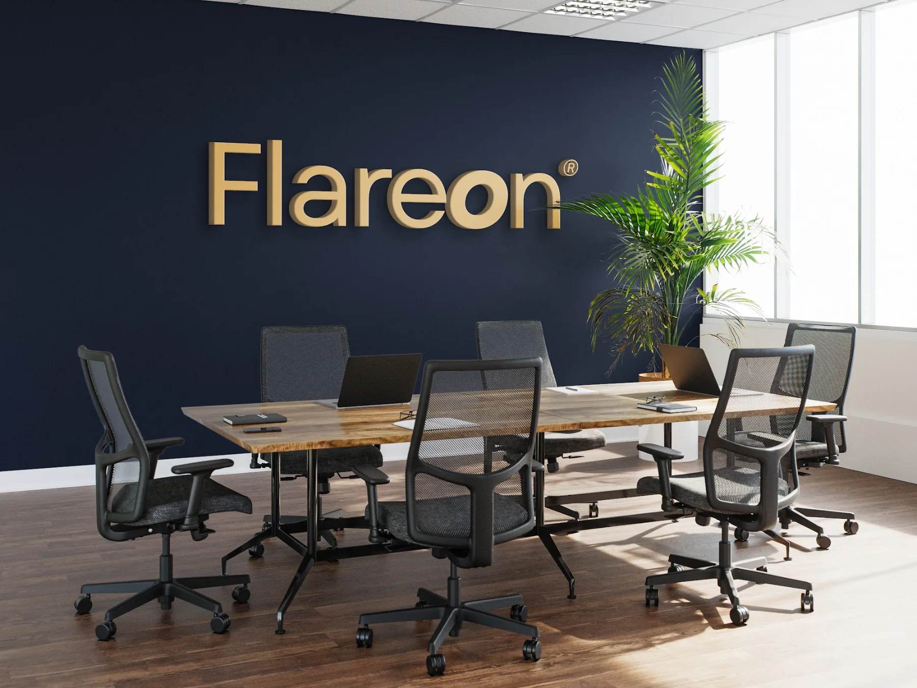 Le logo Flareon en lettres dorées dans une salle de réunion