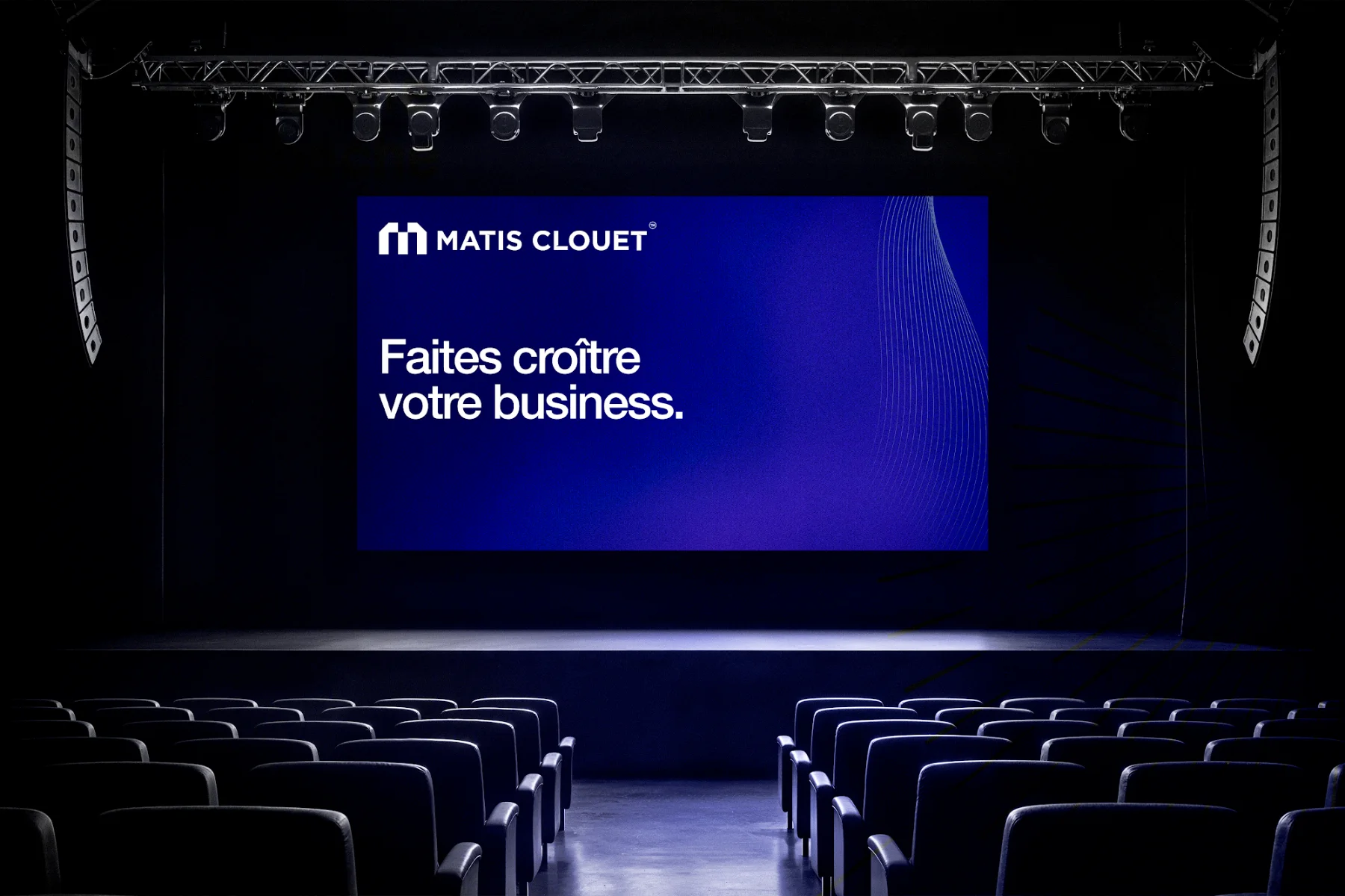 « Faites croître votre business » projeté sur une scène