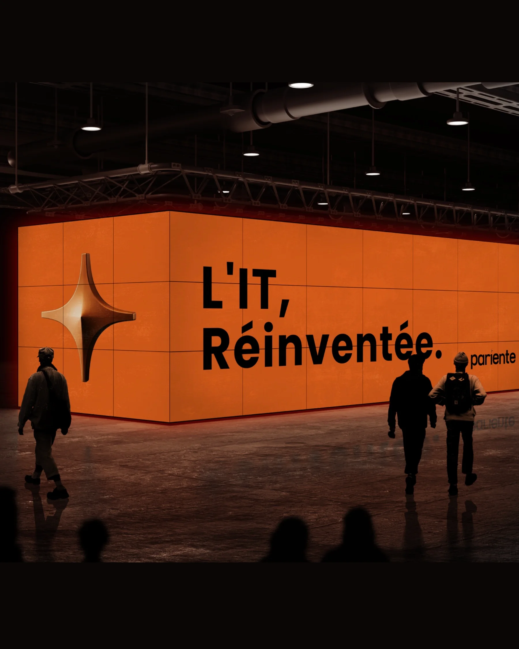 Un écran géant « L'IT, réinventée » au nom de Pariente