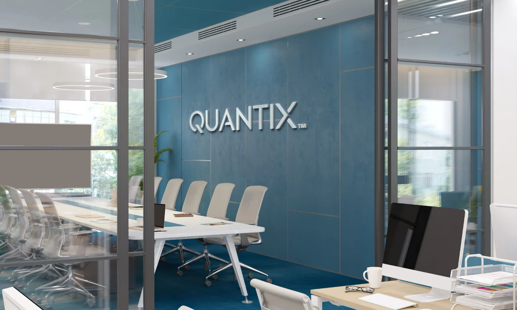 Le logotype Quantix sur la vitre d'une salle de réunion