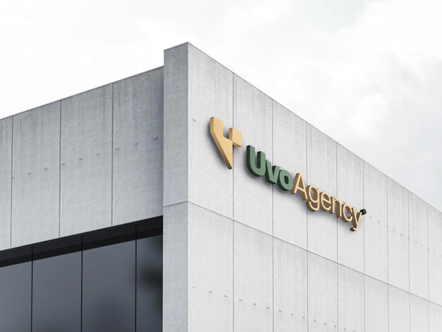 Le logo Uvo Agency en lettres sur une façade